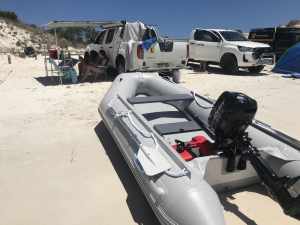 Inflatable pontoon with 5 hp motor
