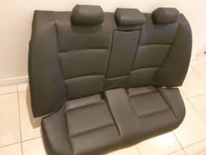 BMW E90 black leather fixed back rear seat complete


