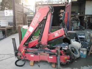 Truck Crane Fassi F65 removed from truck.