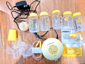 Medela swing electric breast pump with free extra bottle
