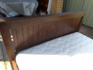 Wooden framed double bed with pillow top mattress