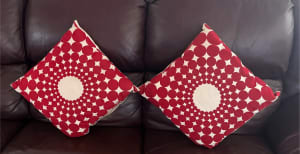 Pair of Red velvet spotted cushions