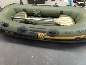 Inflatable Sevylor Fish Hunter dinghy with paddles