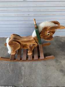 Solid wooden rocking horse