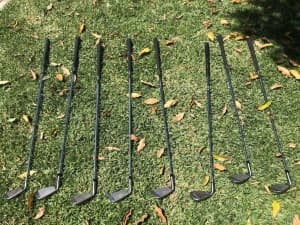 Assorted Golf Clubs - 4 - 9 Iron Sand Wedge & Pitching Wedge