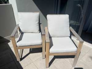 2 outside wooden chairs with cushions. $20 each.