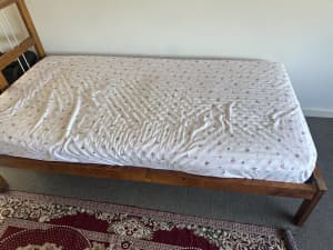 Single matress with bed frame and double mattress