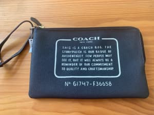 Brand new Coach clutch purse
