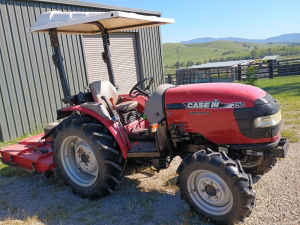 Case Farmall Tractor with slasher and carryall