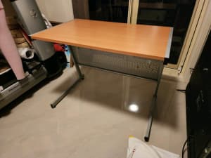 Desk with wooden top and metal structure