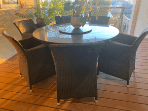 Black Outdoor Marble Dining Table and 6 Rattan Chairs