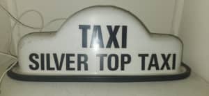 Old silver top taxi sign
