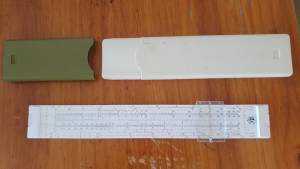 SLIDE RULE. Calculate the old fashioned way