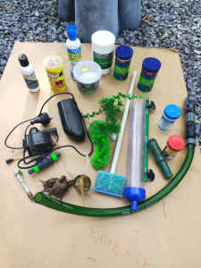 Fish Tank Pump and fish food and cleaning products all for $39.00