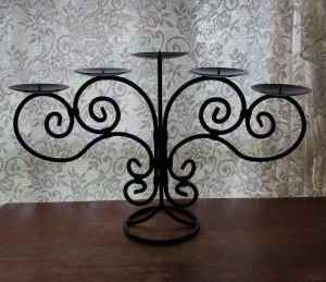Hold***Cast Iron Candle Holder.