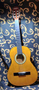 Suzuki Acoustic Guitar.