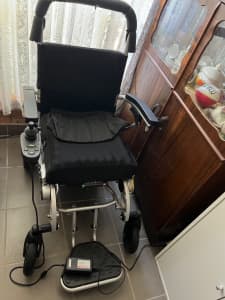 Foldable Electric wheelchair - in as new condition