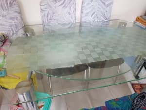 glass dinner table and 6 chairs