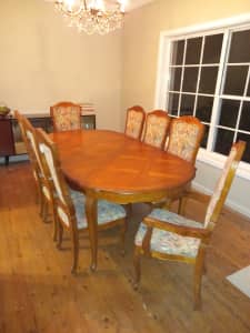French Louis XV style parquetry dining table with 8 chairs.
