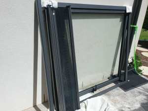 Double-glazed, single awning window with collapsible flyscreen
