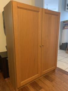 IKEA cabinet with doors and 2 shelves