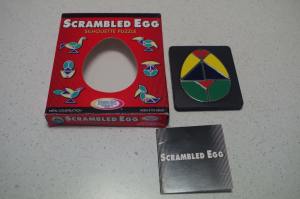 Scrambled egg silhouette metal puzzle