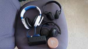 3 headphones and 2 bluetooth speakers