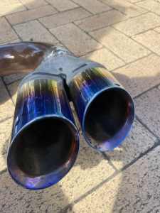 Redback sports muffler with flame tips