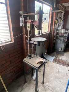 Drill press on steel bench