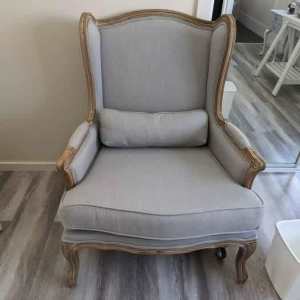 Beautiful French Provincial Wingback Chair and ottoman.