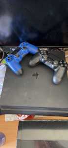 PlayStation 4 with 2 controllers