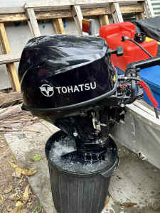 Tohatsu motor and Boat