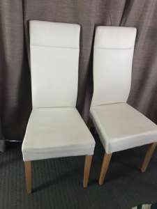 White leather dining chairs