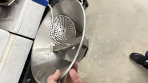 Potato mouli catering equipment or home masher.
