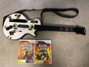 Wii guitar and two games