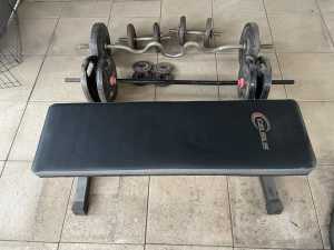 Weight bench and assorted weights plates