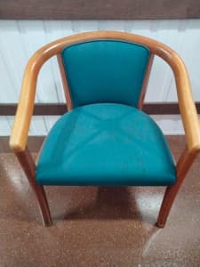 Solid teal covered office chair