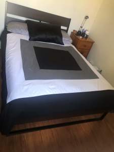 Double bed frame with mattress and new mattress topper