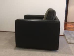 Black leather swivel chair by Arthur G