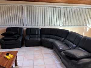King furniture leather dark grey corner lounge and a recliner chair