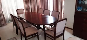 Chisweell 10 seater table with 8 chairs