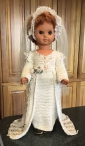 Vintage doll in bridal gown