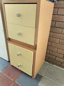 2 X heavy bedside tables each having 2 drawers placed one over another