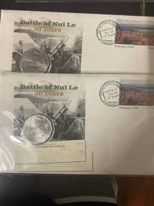 Battle of Nui Le fifty cents coin and AFL sydney swan