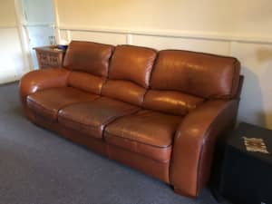 Leather lounge suite - $300 negotiable