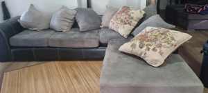 L couch with cushions.