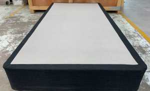 Almost new Black fabric King Single bed base only.Pick up or deliver