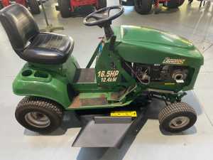 RIDE ON LAWN MOWER-(PRE OWNED COX LAWN BOSS)