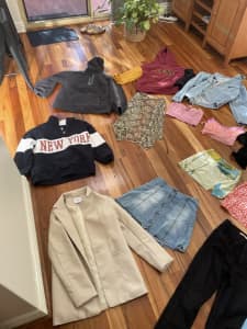 Woman’s tops, skirts, jumpers, leather blazer, Levi’s jeans