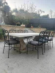 Stone outdoor dining table + chairs